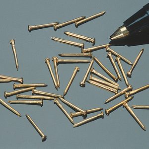 1/4 BRASS BRADS/apx100